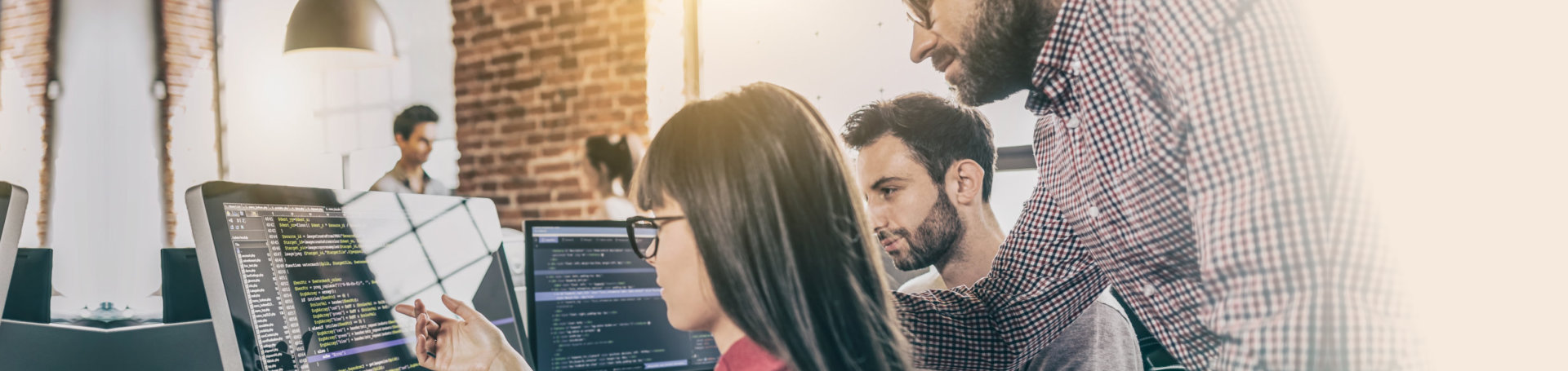 Three people debugging something on their system